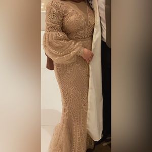 Long sleeve beaded gown with balloon sleeves in champagne